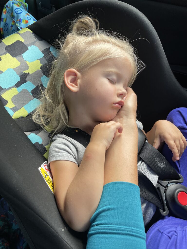 toddler napping in car seat